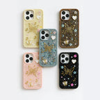 Set of six decorated phone cases on a white background