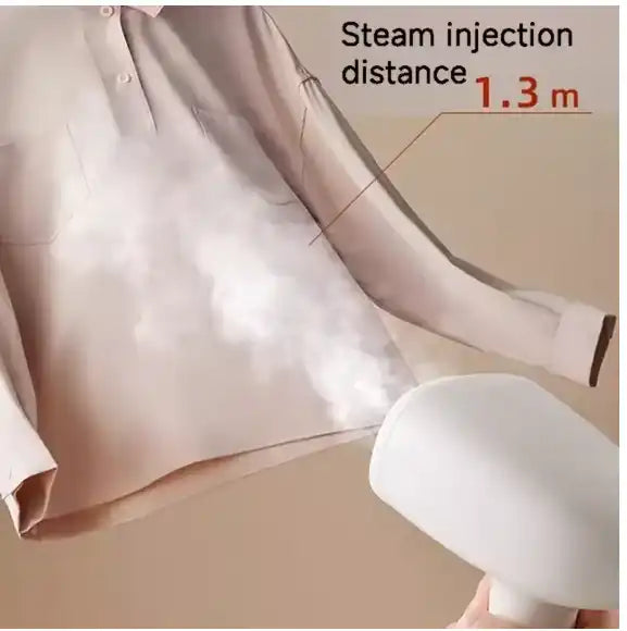 Steam iron being held above a shirt with text indicating steam injection distance.