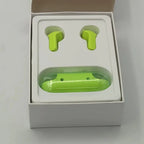 Green wireless earbuds in open box with packaging labeled 'AIR 33' on a gray background